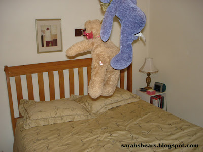 Teddy bears jumping on the bed