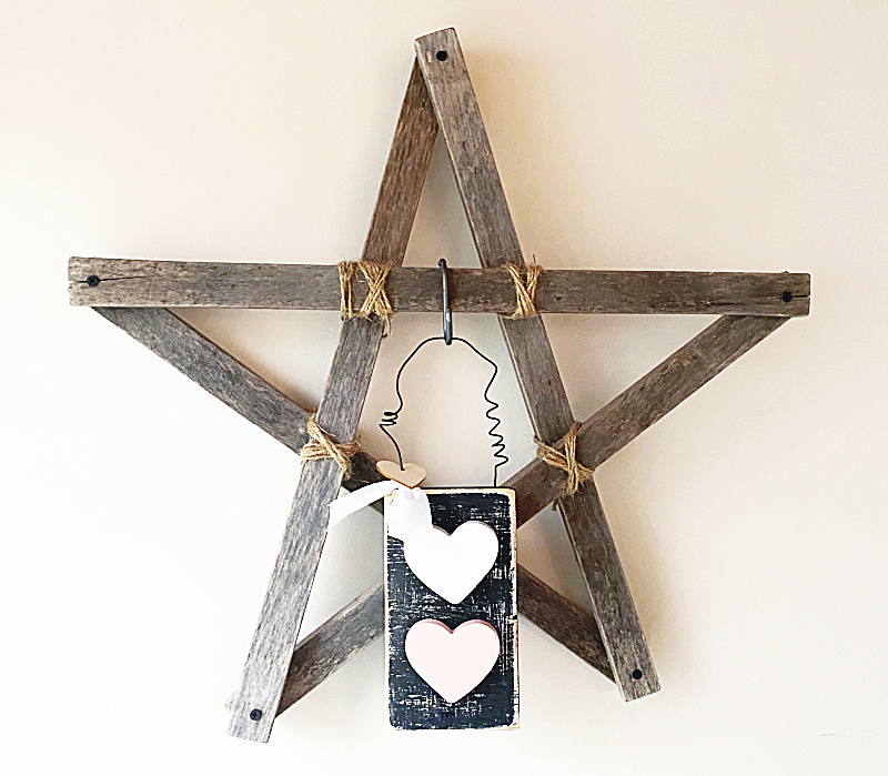 wooden star with rustic hearts