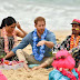 Photos: Royals Harry and Meghan go barefoot on Bondi 