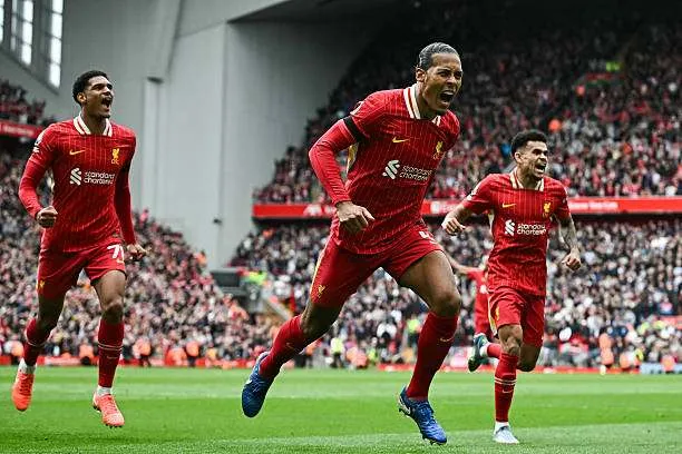 Liverpool defender Virgil van Dijk celebrates after scoring his team’s second goal during the Premier League match against West Ham United at Anfield in Liverpool, England, on April 13, 2025. Photo by Paul Ellis/AFP