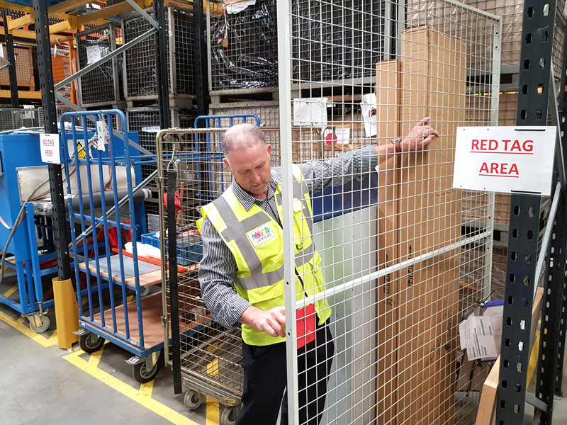 David Burton examines items in the red tag area at Garador's Yeovil production facility