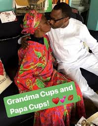 Photograph Of Femi Otedola And His Mother Kissing On The Lips