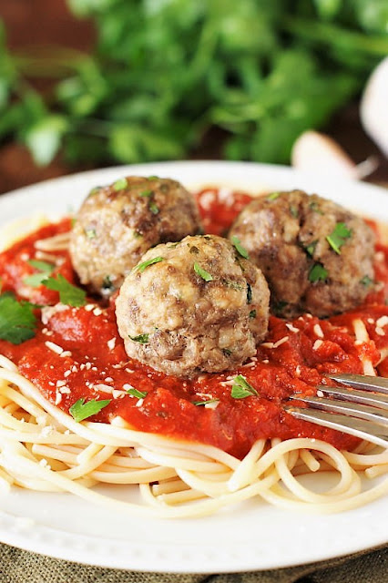 Baked Homemade Meatballs on Spaghetti Image
