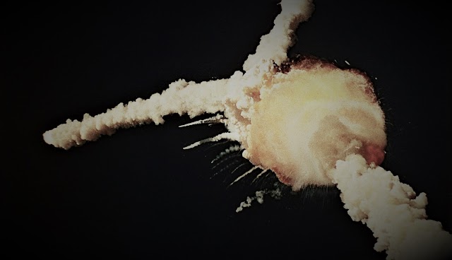 what was the reason the challenger exploded? and where did they find the wreckage?