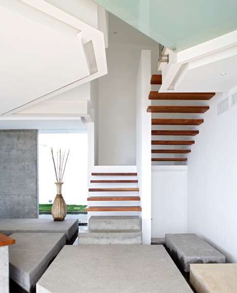 Photo of minimalist wooden staircase inside of the house