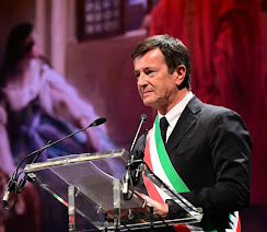 Bergamo's mayor, Giorgio Gori, speaks to the audience at Teatro Donizetti