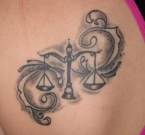 Scorpion tattoo with Scorpio zodiac symbol. Mexican 