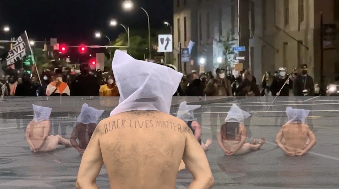 Manifestantes desnudos y con capuchas protestan  frente al cuartel general de Rochester contra asesinato de Prude 