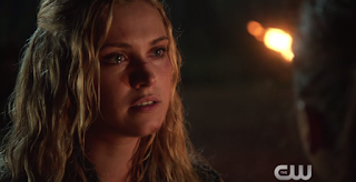 Clarke confronting a Grounder commander