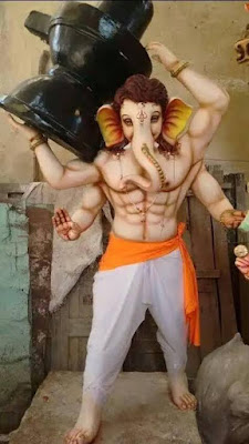 Lord Ganesh holding the Shiva Linga