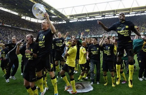 Borussia Dortmund players celebrate after winning the Bundesliga title