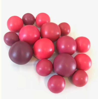 Colour mixing red polymer clay beads | Commissions at Lottie Of London