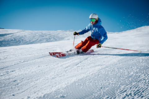 man-ice-skiing-on-hill