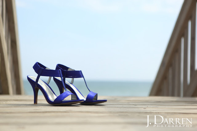 photo of the Wedding shoes on the beach.  Emerald Isle North Carolina Beach wedding