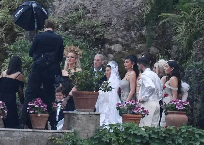 Kourtney Kardashian stuns in a minidress wedding gown as she marris Travis Barker again (Photos)