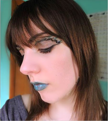 Ultima Beauty with Closed eyes wearing Philadelphia Eagles inspired makeup