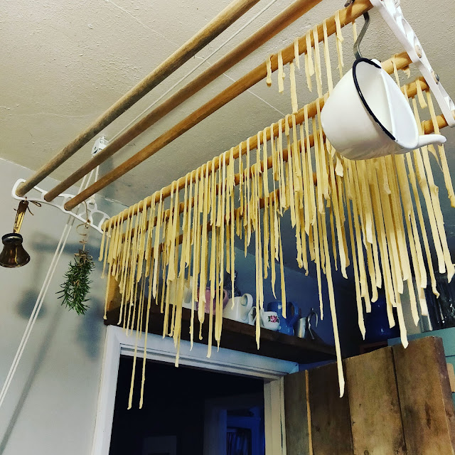 drying pasta over vintage style washing airer