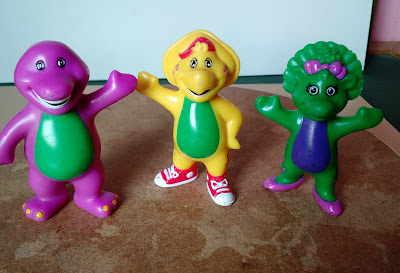 (vendida) Miniatura de vinil estática de Barney roxo 8,5cm , B.J amarela 8cm  e Baby bop verde 8cm -  1995 the Lyons Group  - R$ 15,00 cada