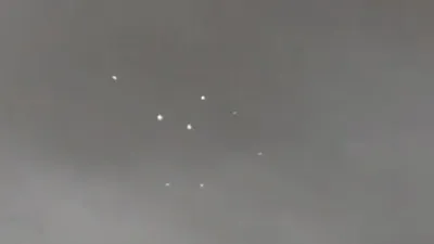 Epic video of a large group of UFOs over Mexican town.