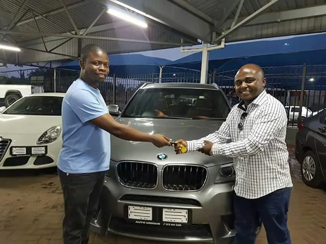 Photos: Wealthy Malawi pastor, Prophet Shepherd Bushiri surprises two members of his media team with brand new BMW X3