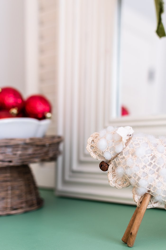 red ornaments in ironstone bowl, vintage doily sheep