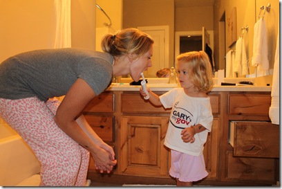 Abigail brushing mom's teeth 7-24-2010 12-18-38 AM