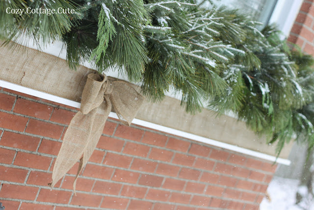 Red and white holiday porch decorations at Creatively Southern :