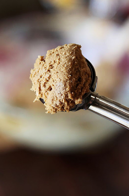 Scooping Cake Mix Molasses Crinkle Cookie Dough Image