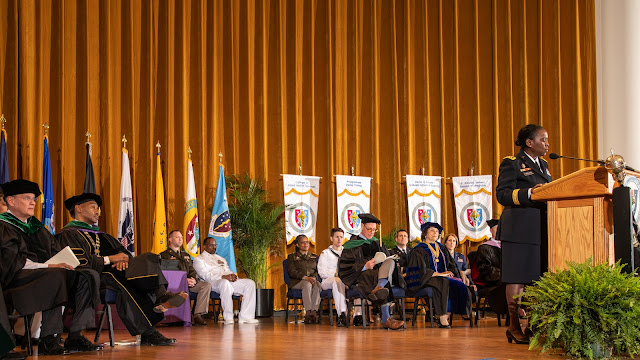 More than 360 uniformed and civilian health professionals graduated from USU on May 20. (Photo credit: Tom Balfour, USU)