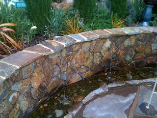 Green Acres retaining wall with rill