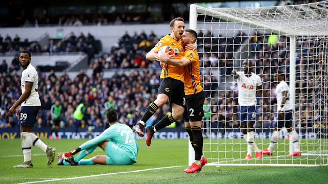 Diogo Jota and a teammate celebrate Wolves goal at Tottenham