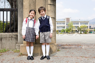 a boy holding a girls hand