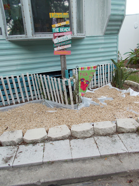 coquina shells, DIY, build a beach, landscpaing with sea shells, dune fence, directional pole,