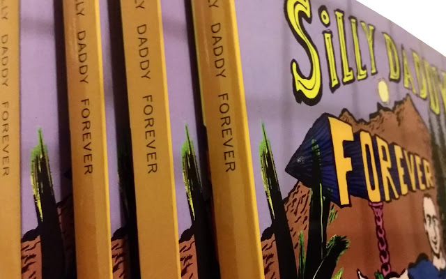 Silly Daddy Comics on book shelf by Joe Chiappetta