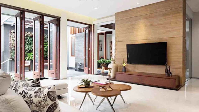desain ruang keluarga dengan tv dinding