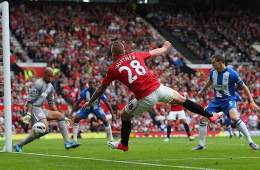 Alexander Büttner scores Manchester United's third goal against Wigan from acute angle