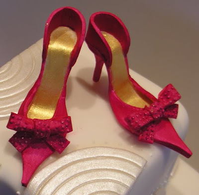 The bride wore white and a pair of fabulous red shoes The cake artists at