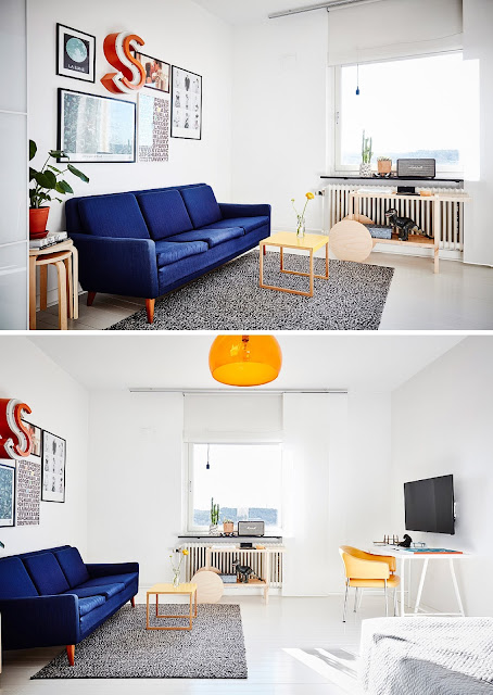 un estudio con un sillon azul, lampara amarilla y paredes blancas en estilo nordico,