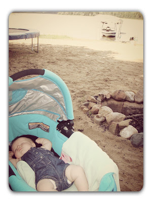 Baby sleeping at the lake