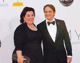 Actress Melissa McCarthy and husband Ben Falcone arrive at the 64th Primetime Emmy Awards in Los Angeles