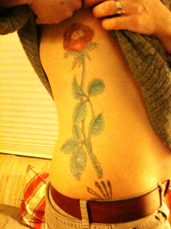 The wild rose on my side is what I still believe to be my final tattoo 