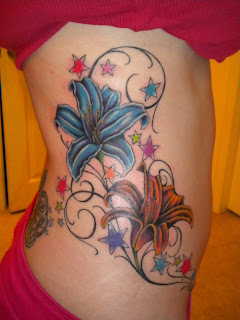 stars tattoo and lilies tattoo