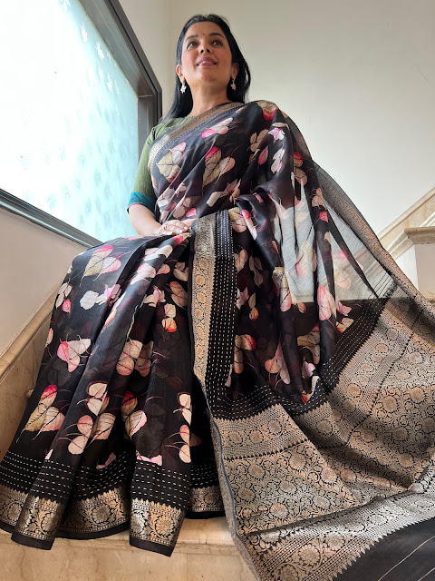 Elegance in Contrast: Unveiling the Black Digital Printed Saree with Pink Leaves and Zari Accents