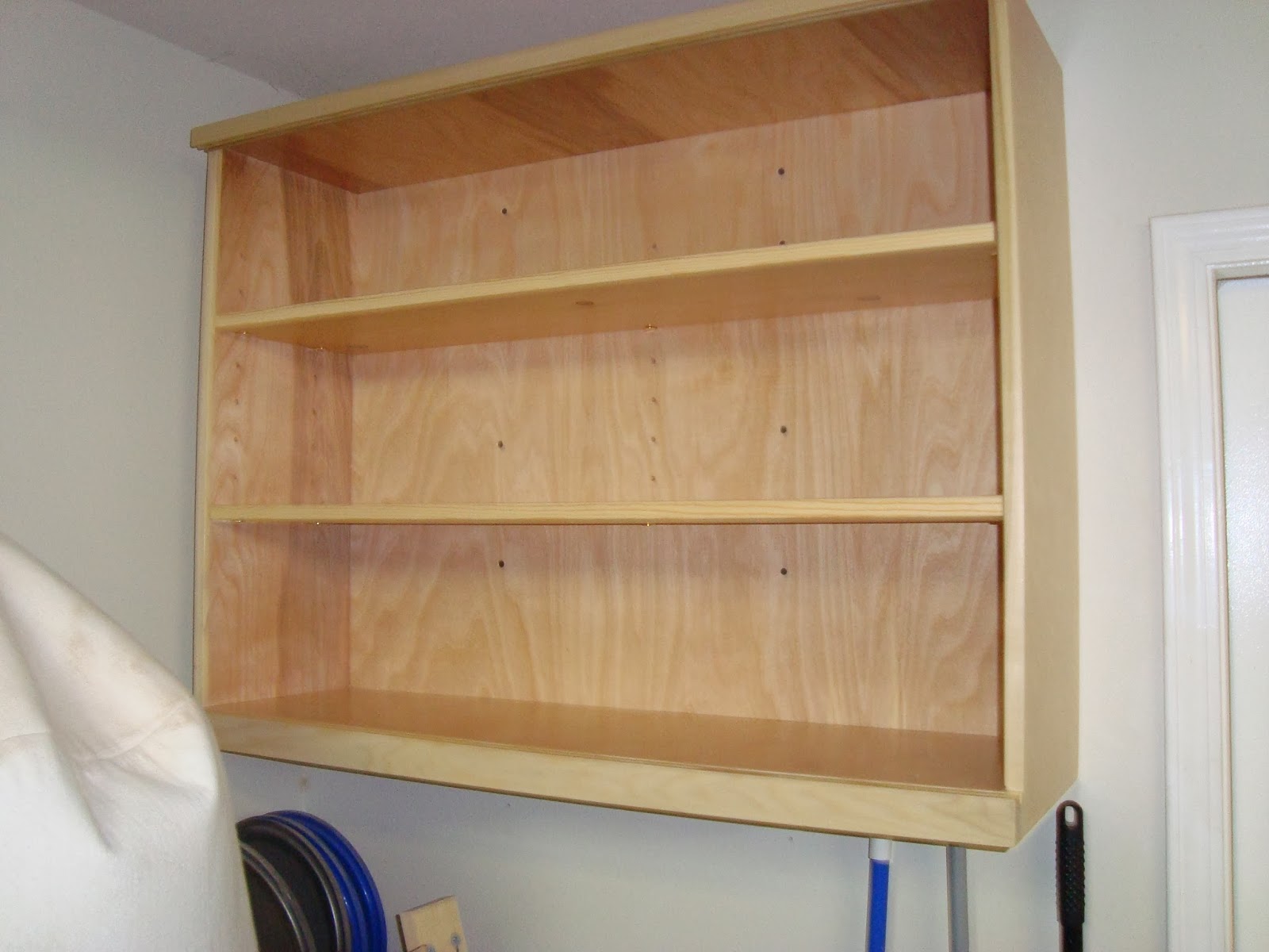 Pull in plywood shelves for your home which is economical and gives 