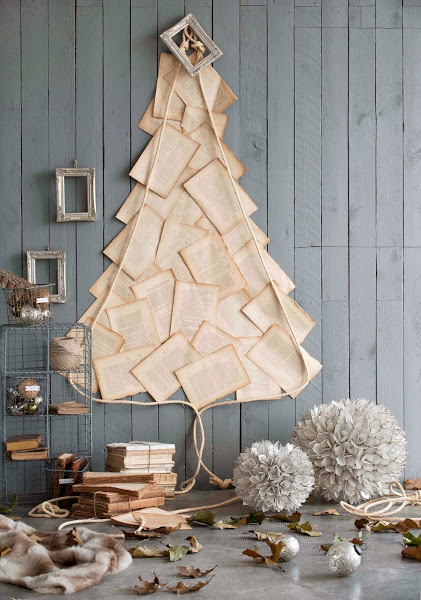 http://decoracion.facilisimo.com/blogs/general/arboles-de-navidad-en-la-pared_964579.html