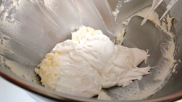 a bowl with beaten butter and marshmallow cream