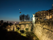 Porta San Giacomo of Città Alta in the evening with moon