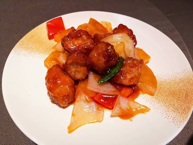 Crisp-fried Sweet and Sour Dough Fritter stuffed with Prawn Paste