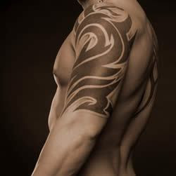 Tribal Arm And Shoulder Tattoo