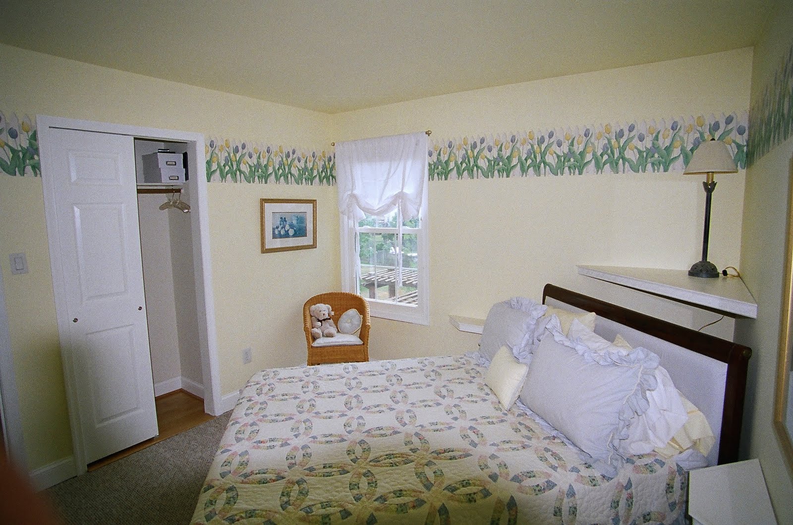 From corner to window/closet wall. Note laminate flooring in closet ...